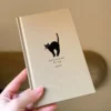 d358af6eea2543b4a1684972bd00e200-goods.webp 1pc 2025 Cycle Plan B6 Cute Black Cat Design Linen Notebook
